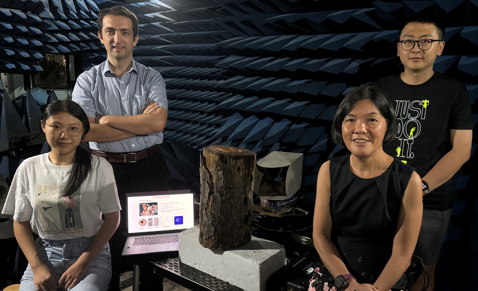 Research team with the tree radar system in the anechoic chamber
